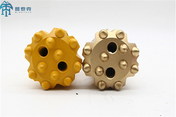 Outil de forage souterrain à bouton de rétraction sphérique au carbure de tungstène